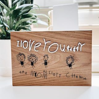 childrens art plaque on oak wood with white layered text