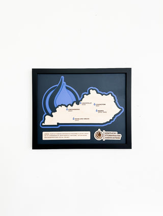 framed award with the shape of kentucky in wood with engraved details and a acrylic blue water droplet
