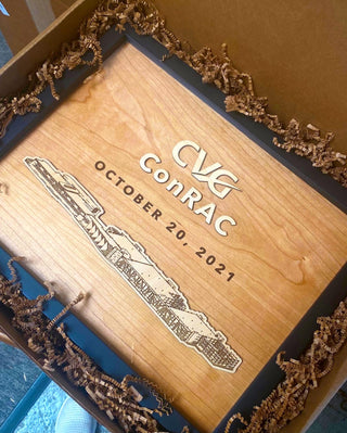 custom framed wood art with layered company name and image and engraved date 