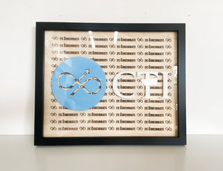 custom framed wood art with engraved company name and raised company blue logo and letters