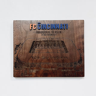 custom hard wood sign with engraved stadium image and orange and blue raised lettering 