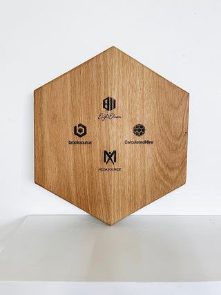 custom hexagon cutting board with engraved company logos 