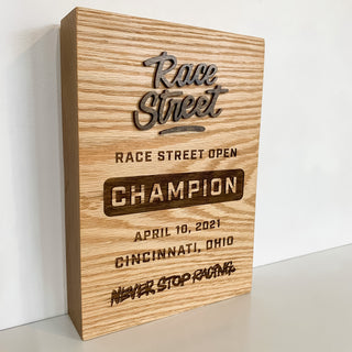 oak thick profile award with engraved text and raised wood text