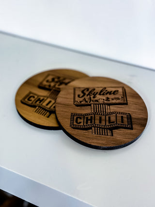 custom walnut coasters with engraved skyline chili design 