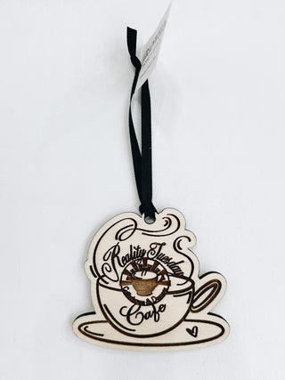 custom wood engraved ornament in the shape of a tea cup 