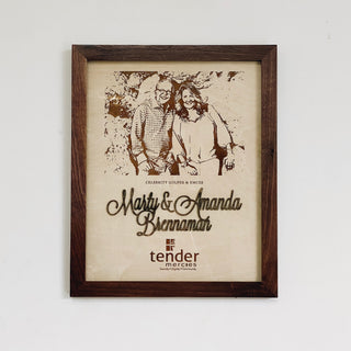 custom framed wood engraved image with raised lettering and engraved company logo at bottom