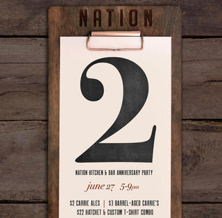 custom wood board with clip for restaurant menu, business name etched at top 