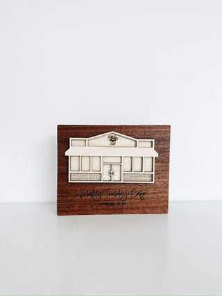 custom wood plaque with layered building and engraved details