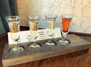 custom wood serving board to place a flight of drinks, company logo towards edge