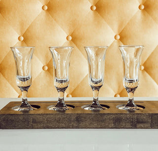 custom wood serving board with indents to place a flight of drinks 