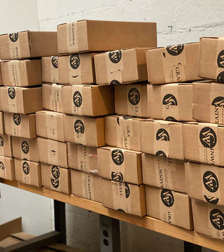 boxes sealed with grainwell branded tape
