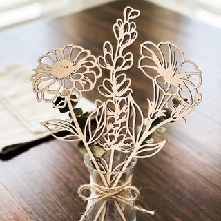 Decorative vase with laser-cut floral designs